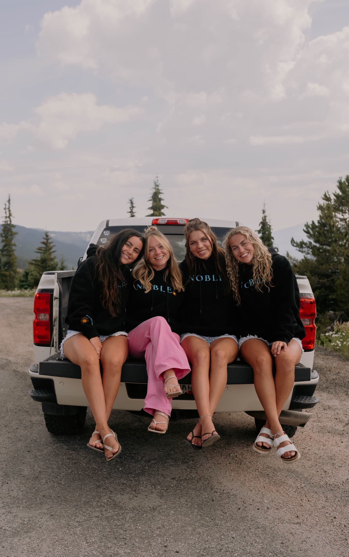 Elevate women at outdoor event